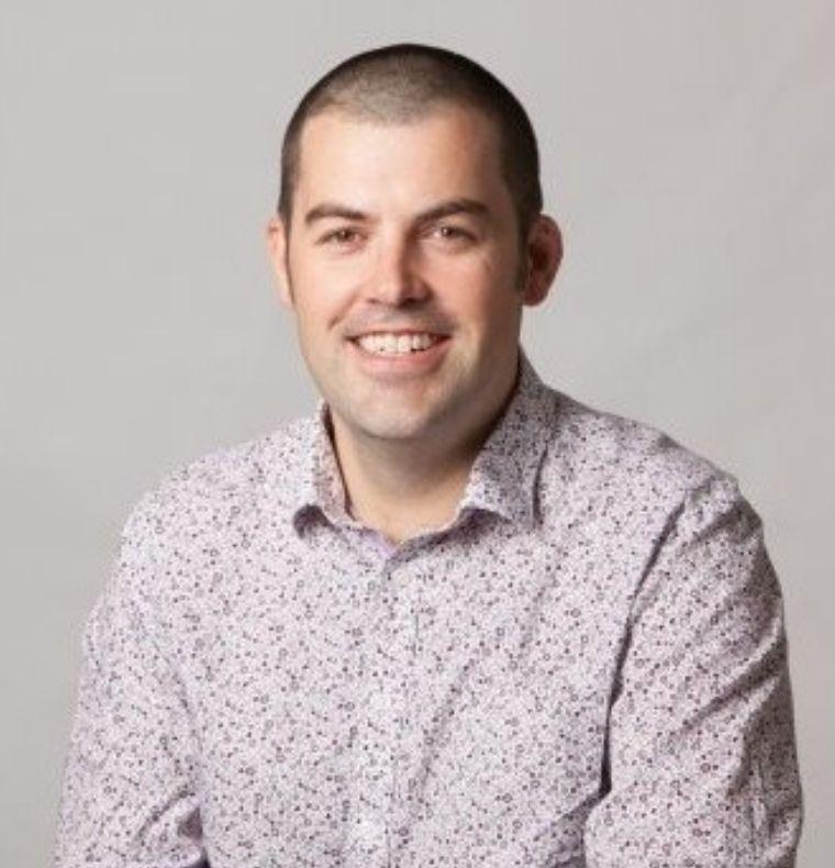 Professional business headshot of Calum McGonigle