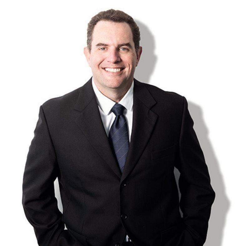 Professional business headshot of Mark Winter