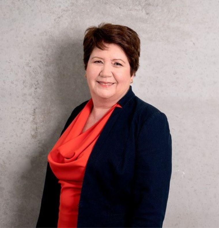 Professional business headshot of Kathleen Walmsley