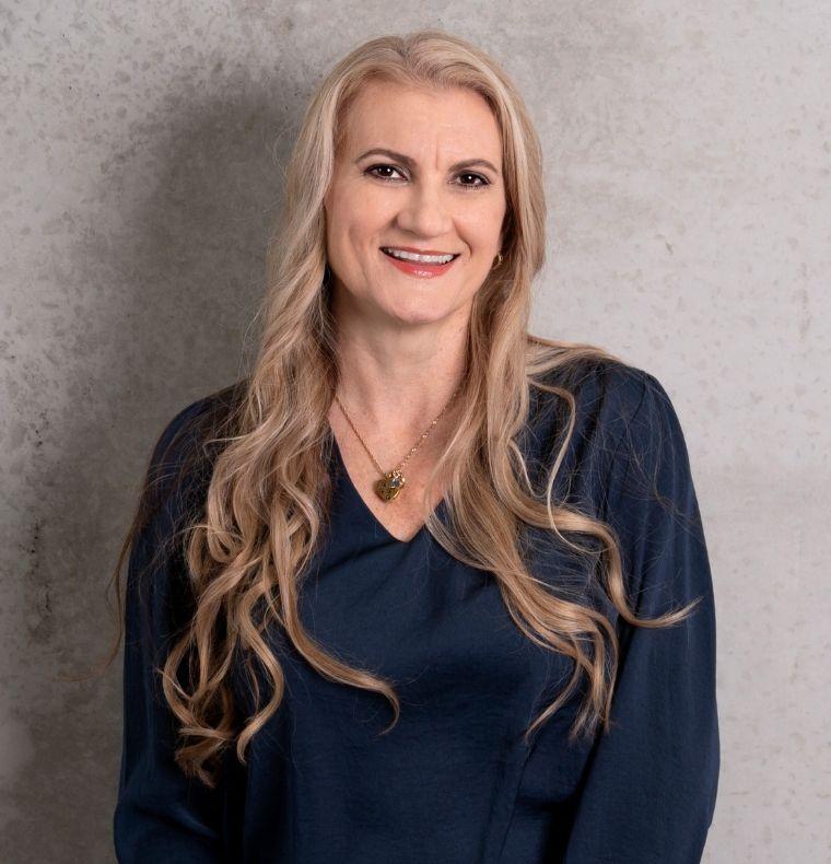 Professional business headshot of Norelle Targato