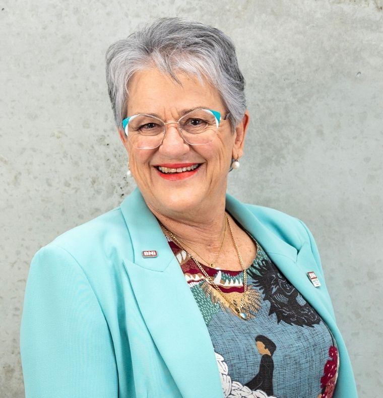 Professional business headshot of Robyn Robson