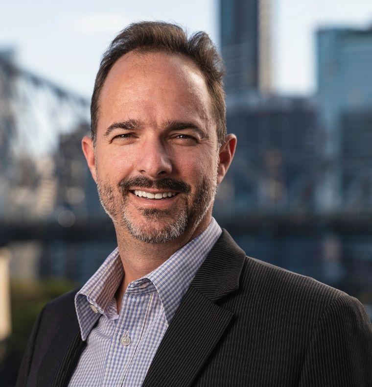 Professional business headshot of Mark Spicer