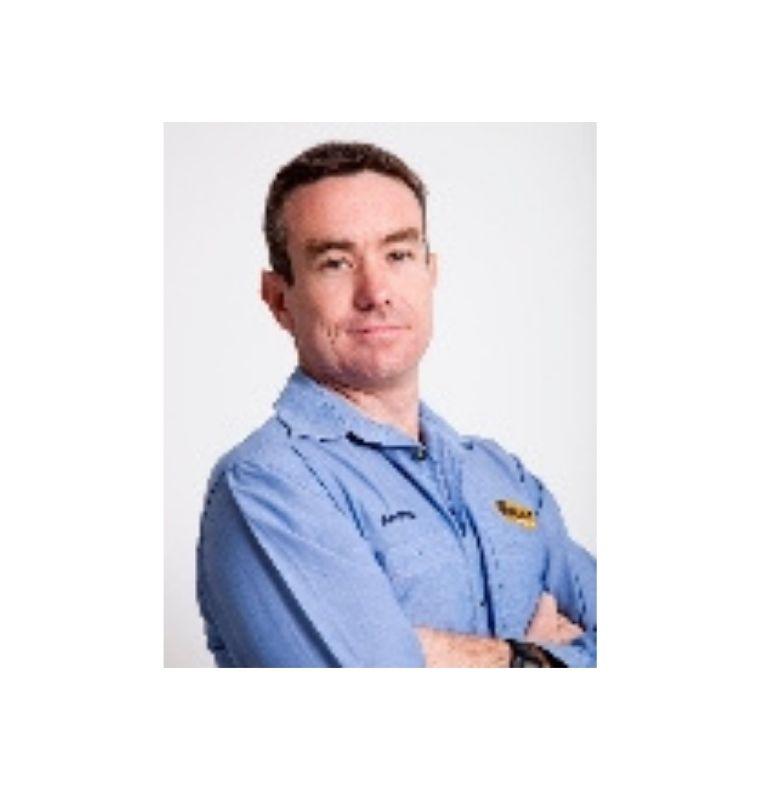 Professional business headshot of Andrew Reilly